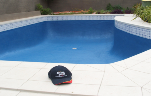 cap 5 - old pebble line pool brought back to life with Epoxy Resin coating and new deck paving